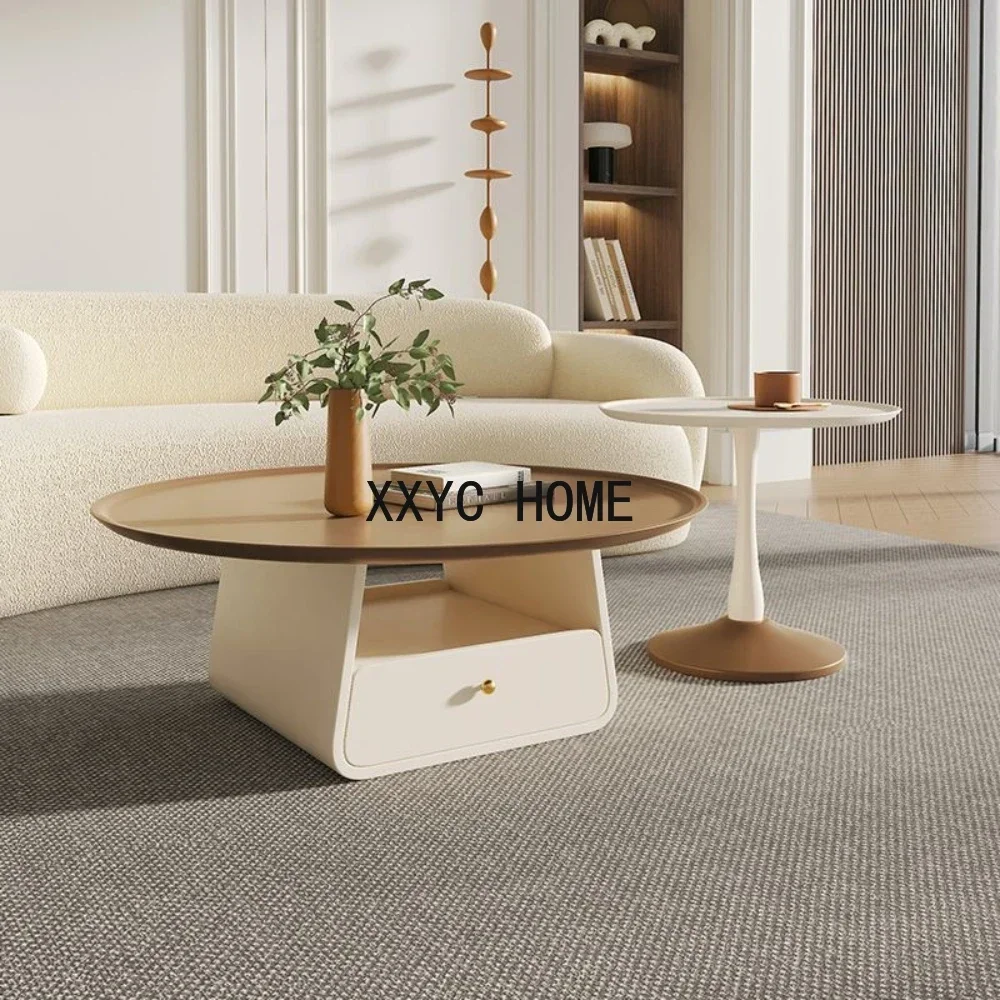Cream-style round coffee table, living room, home simple, modern table, artistic sense, light luxury, rock slab, net red tea tab
Cream-style round coffee table, living room, home simple, modern table, artistic sense, light luxury, rock slab, net red tea tab