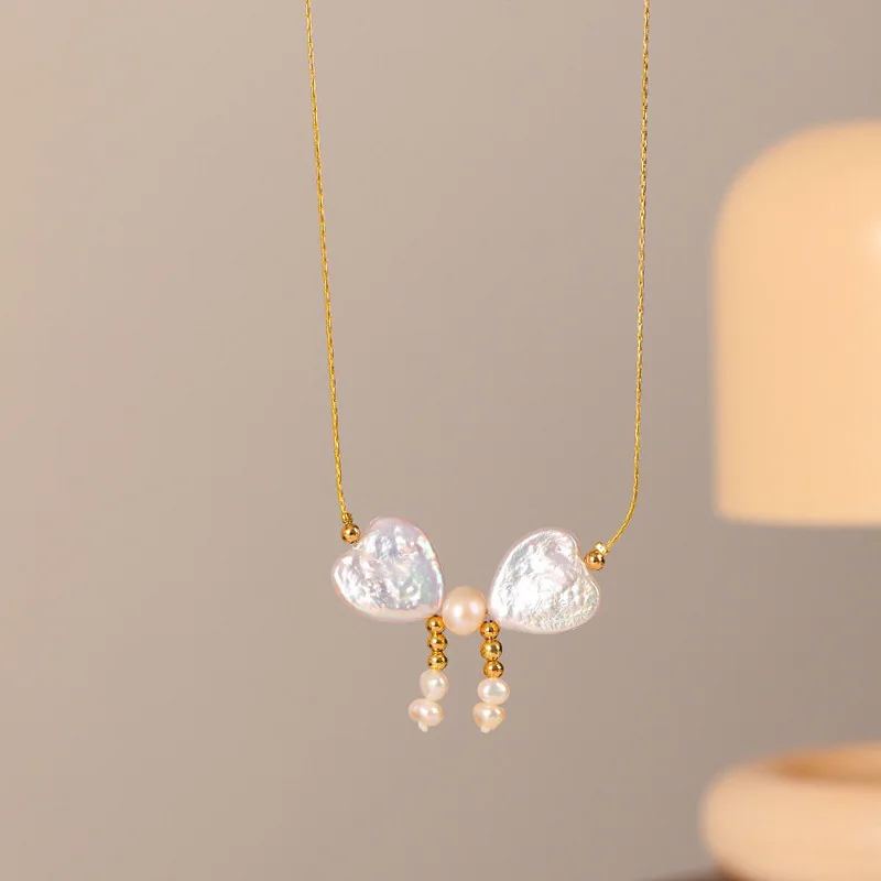 Fashion White Heart Natural Freshwater Pearl Bow Charms Necklace, Versatile, High-end, Elegant, Simple Love Clavicle Chain
Fashion White Heart Natural Freshwater Pearl Bow Charms Necklace, Versatile, High-end, Elegant, Simple Love Clavicle Chain