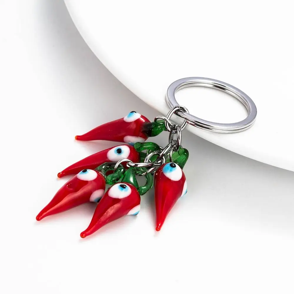 Брелок Evil Eye Lucky Eye Red Chilli, красный чили, мультяшный брелок Evil Eye, модный прочный автомобильный брелок для ключей, автомобильный брелок
Брелок Evil Eye Lucky Eye Red Chilli, красный чили, мультяшный брелок Evil Eye, модный прочный автомобильный брелок для ключей, автомобильный брелок