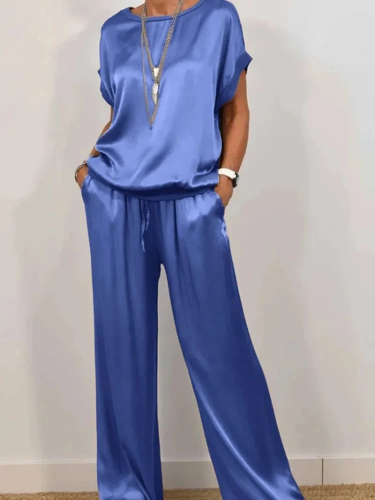 2025 New in Summer Women's Clothing Solid Color Fashion Casual Loose Short Sleeves Round Neck Shirt Wide-leg Long Pants Sets
2025 New in Summer Women's Clothing Solid Color Fashion Casual Loose Short Sleeves Round Neck Shirt Wide-leg Long Pants Sets
