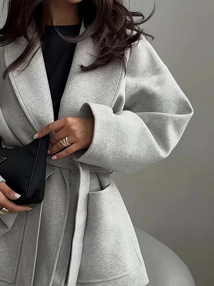 Elegant Lapel Women Solid Color Commute Coat Autumn Winter New Long Sleeve Outerwear With Belt Fashion Loose Tie Up Pocket Coat
Elegant Lapel Women Solid Color Commute Coat Autumn Winter New Long Sleeve Outerwear With Belt Fashion Loose Tie Up Pocket Coat