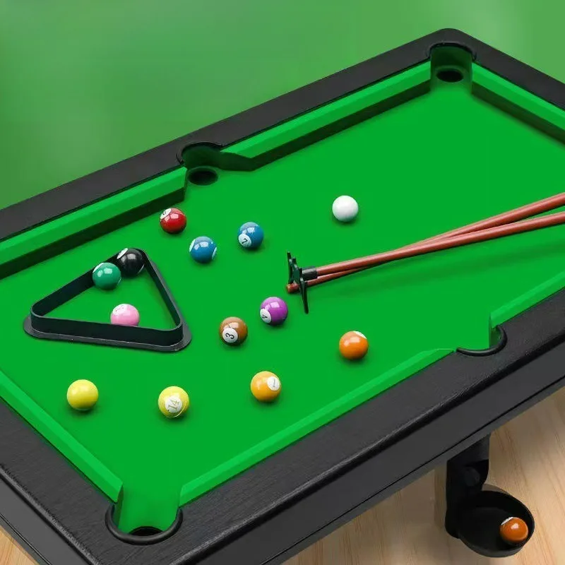Billiards toy table, home indoor mini desktop billiards table, children and parent-child interaction
Billiards toy table, home indoor mini desktop billiards table, children and parent-child interaction