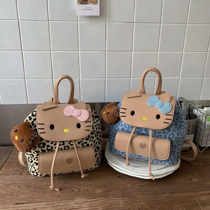 Kawaii Hello Kitty леопардовый рюкзак с героями мультфильмов, модная сумка на одно плечо, милая девчачья сумка-ведро с сердечком на шнурке, рюкзак в подарок
Kawaii Hello Kitty леопардовый рюкзак с героями мультфильмов, модная сумка на одно плечо, милая девчачья сумка-ведро с сердечком на шнурке, рюкзак в подарок