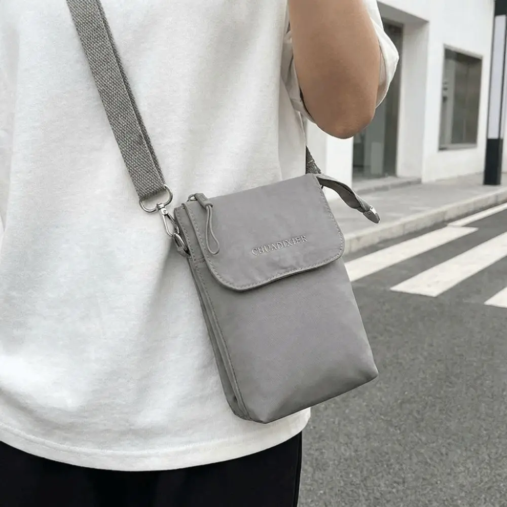 Solid Color Nylon Phone Bag Ultra Lightweight Simple Design Mini Crossbody Bag Versatile Style Adjustable Strap
Solid Color Nylon Phone Bag Ultra Lightweight Simple Design Mini Crossbody Bag Versatile Style Adjustable Strap