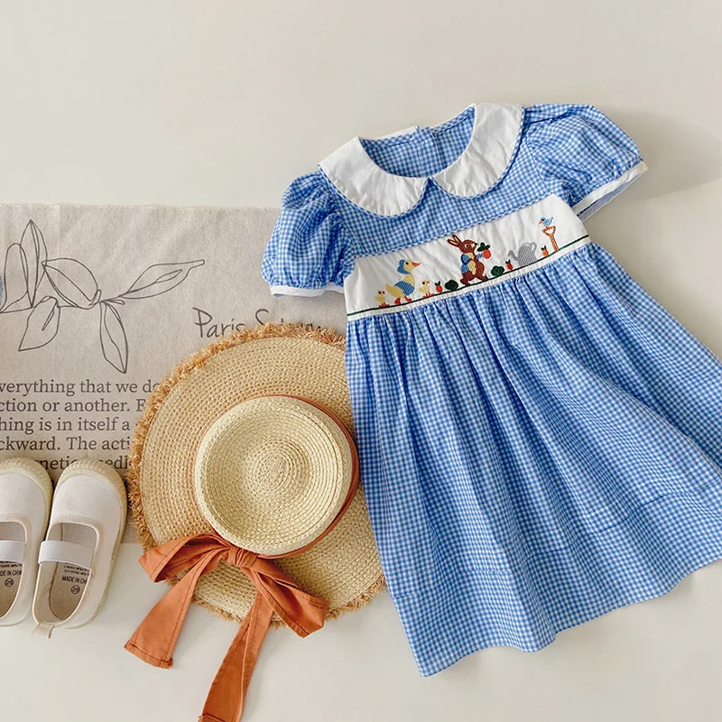 Korean Children's Plaid Dress with Animal Embroidery And Puffy Sleeves Doll Collar Spring/Summer Fashion Kids' Clothing
Korean Children's Plaid Dress with Animal Embroidery And Puffy Sleeves Doll Collar Spring/Summer Fashion Kids' Clothing