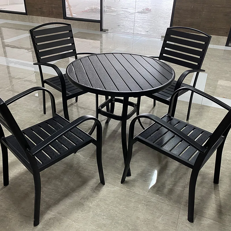 Outdoor table and chair, simple plastic wood table and chair set, small coffee table, leisure wrought iron table and chairs
Outdoor table and chair, simple plastic wood table and chair set, small coffee table, leisure wrought iron table and chairs