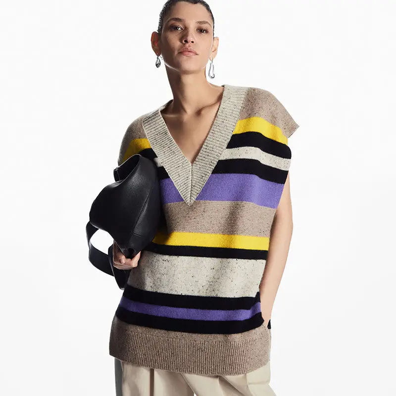 XIMIAN APPAREL 2026 traf cos autumn new style of Ladies' casual V-neck multi-color striped loose sleeveless knitted vest
XIMIAN APPAREL 2026 traf cos autumn new style of Ladies' casual V-neck multi-color striped loose sleeveless knitted vest