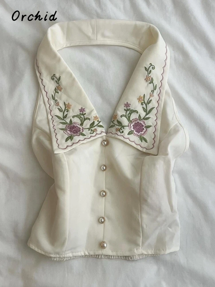 Elegant Floral Embroidery Sleeveless Tanks Top For Women 2025 Summer Vintage Slim Fit Crop Top Turn Down Collar Sexy Vest
Elegant Floral Embroidery Sleeveless Tanks Top For Women 2025 Summer Vintage Slim Fit Crop Top Turn Down Collar Sexy Vest