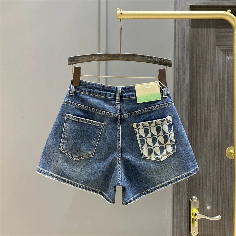 2025 Summer New Heart Printing Pocket Washed Denim Shorts Women's Fashion Loose High Waist Wide Leg Shorts Ropa De Mujer
2025 Summer New Heart Printing Pocket Washed Denim Shorts Women's Fashion Loose High Waist Wide Leg Shorts Ropa De Mujer