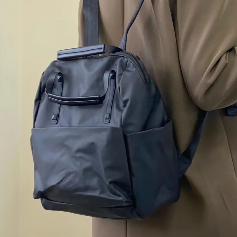 Водонепроницаемый нейлоновый рюкзак нового дизайна, модная и универсальная, легкая дорожная сумка, сумки для книг для студентов колледжа
Водонепроницаемый нейлоновый рюкзак нового дизайна, модная и универсальная, легкая дорожная сумка, сумки для книг для студентов колледжа