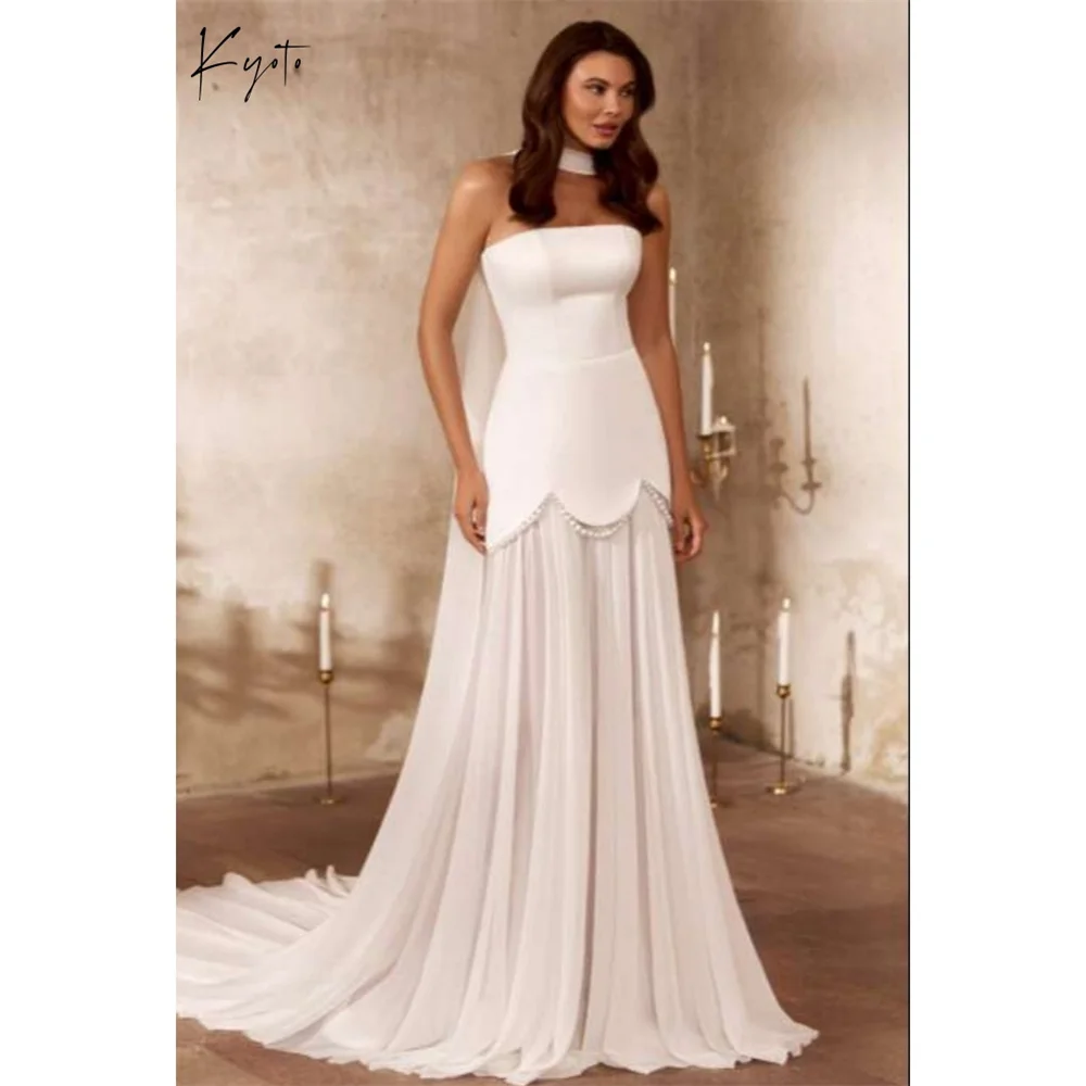 Kyoto Customized White Strapless Satin Wedding Dress Zip Back Sleeveless vestidos de noche Elegant A-Line robe de mariée 2026
Kyoto Customized White Strapless Satin Wedding Dress Zip Back Sleeveless vestidos de noche Elegant A-Line robe de mariée 2026
