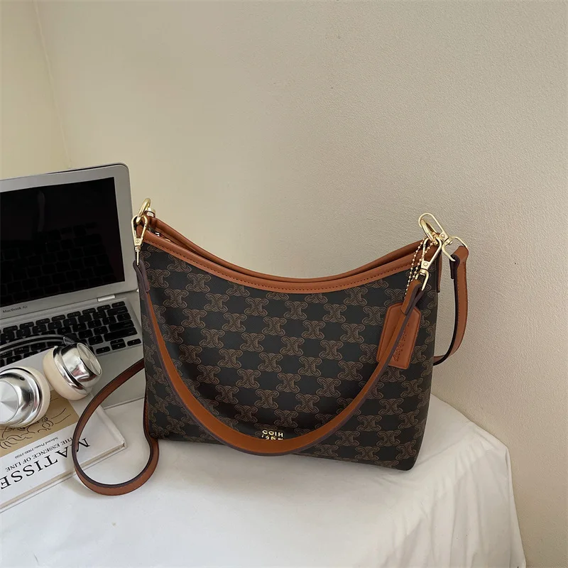 Luxury Retro Large Tote Bag Women Designer Fashion Commuter Bag Versatile Niche Shoulder Crossbody Bag High Quality
Luxury Retro Large Tote Bag Women Designer Fashion Commuter Bag Versatile Niche Shoulder Crossbody Bag High Quality
