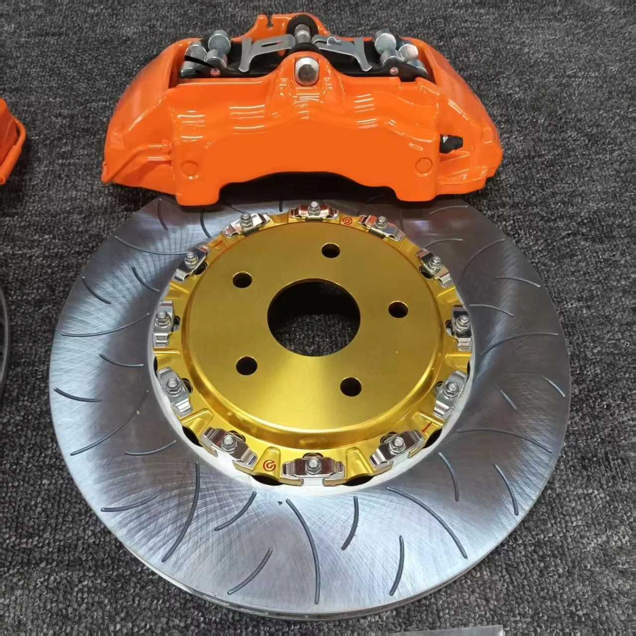 Auspicious Orange 6pot Calipers Paired Gold Center Discs 355 Brake Discs for 2024 Revo Alphard Supra MK4 LC200 LC300
Auspicious Orange 6pot Calipers Paired Gold Center Discs 355 Brake Discs for 2024 Revo Alphard Supra MK4 LC200 LC300