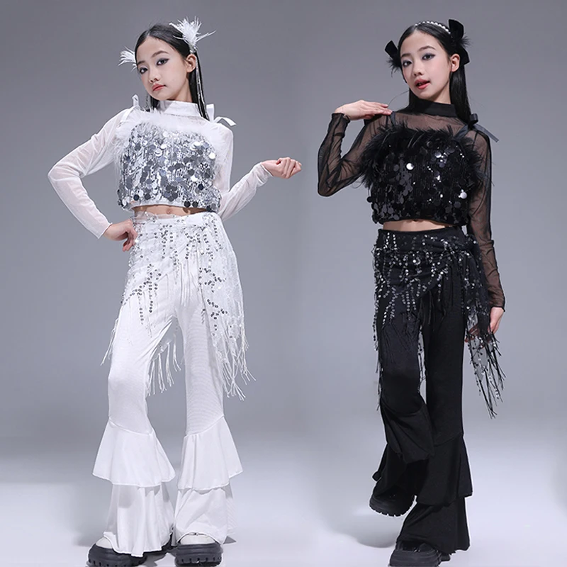 Kpop сценический костюм для девочек, модная одежда, жилет с блестками, черные брюки-клеш, белый детский костюм для выступлений, уличная одежда VDL3156
Kpop сценический костюм для девочек, модная одежда, жилет с блестками, черные брюки-клеш, белый детский костюм для выступлений, уличная одежда VDL3156