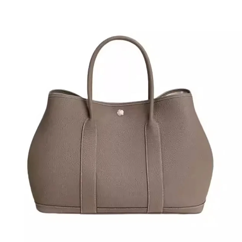 Женские кожаные сумки-тоут для покупок, модная ручная сумка
Женские кожаные сумки-тоут для покупок, модная ручная сумка