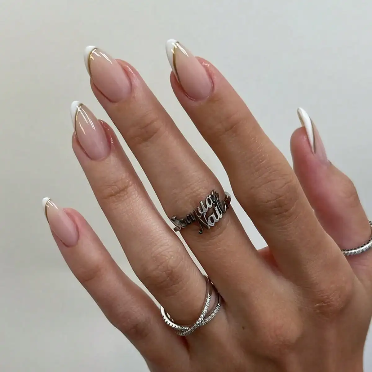 Simple French-Style White Beveled Press-On Nails With Gold Stripes, Almond-Shaped Reusable Nail Tips DVLK
Simple French-Style White Beveled Press-On Nails With Gold Stripes, Almond-Shaped Reusable Nail Tips DVLK