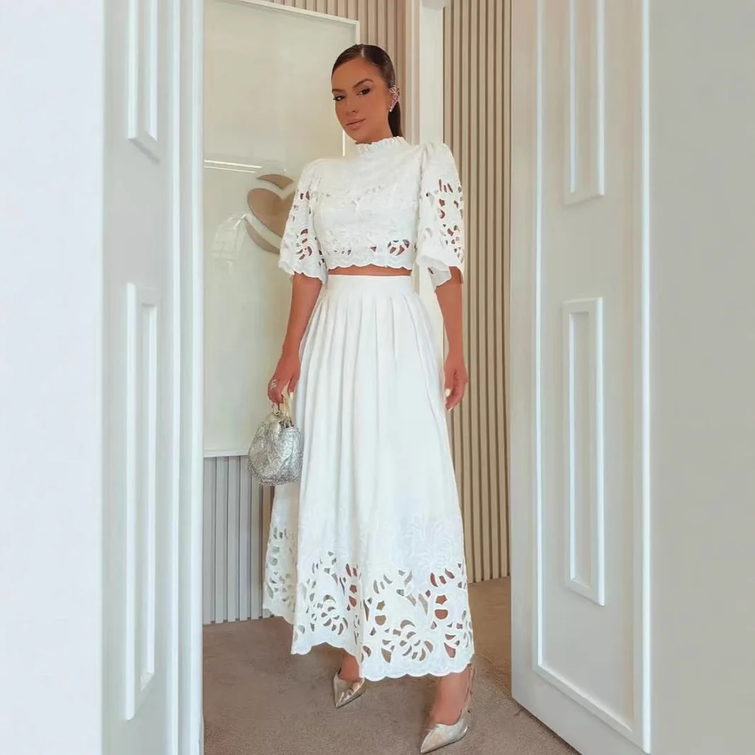 2025 Spring New Stand Collar Short Sleeve Top with Waist Hollow Long Skirt Fashion Suit for Women Костюм Женский
2025 Spring New Stand Collar Short Sleeve Top with Waist Hollow Long Skirt Fashion Suit for Women Костюм Женский