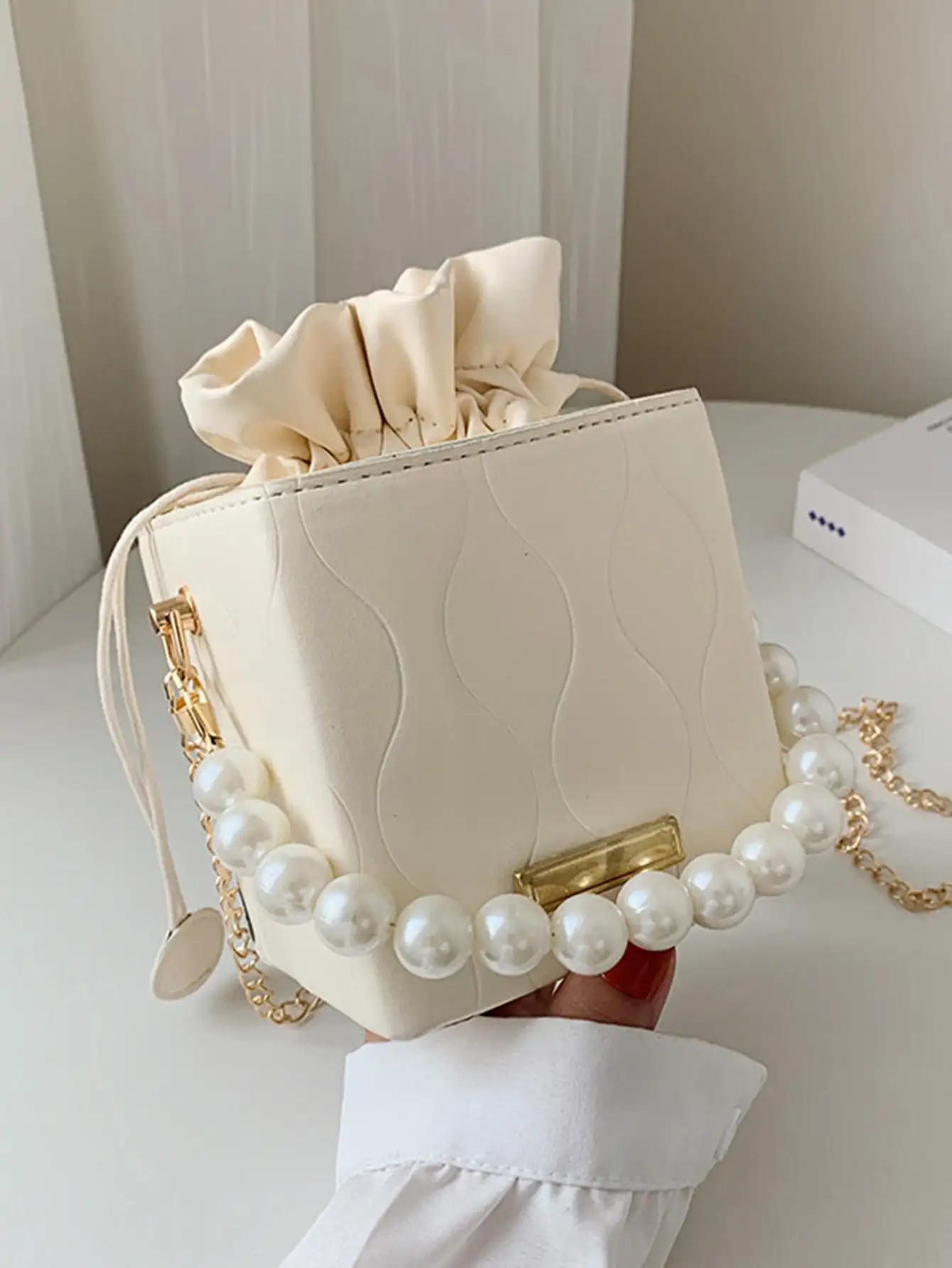 Fashionable Pearl Embossed Drawstring Box Crossbody Bag, Pearl Bag
Fashionable Pearl Embossed Drawstring Box Crossbody Bag, Pearl Bag