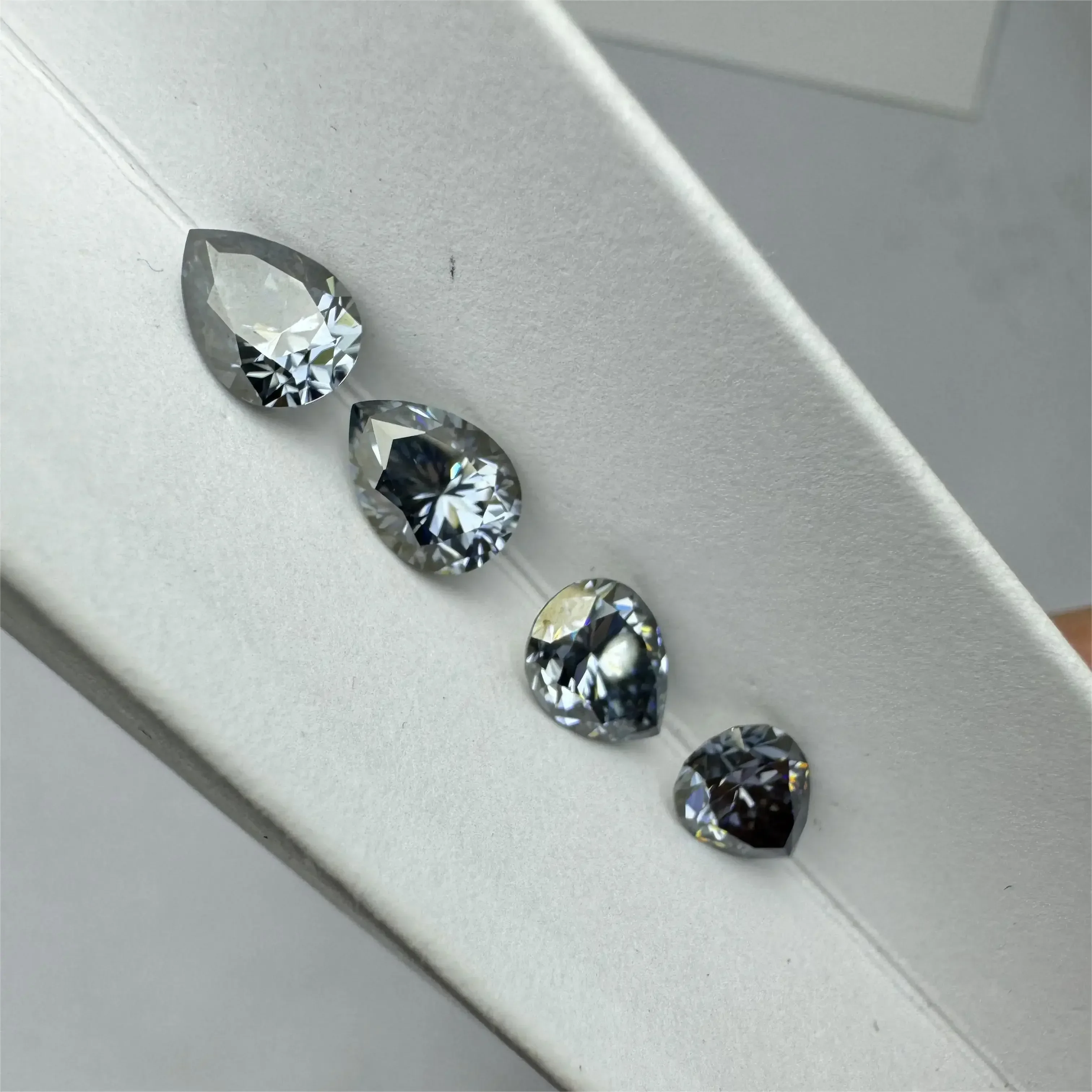 Moissanite Stone Gray Color Pear Cut Top Quality Gemstone For Diy Charms Advanced Jewelry Ring Earring With GRA Certificate
Moissanite Stone Gray Color Pear Cut Top Quality Gemstone For Diy Charms Advanced Jewelry Ring Earring With GRA Certificate