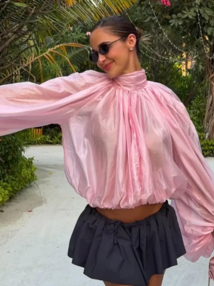 Chic Lantern Long Sleeves Shirt Women High Collar Full Sleeve Pleated Elastic Waist Loose Top 2026 Lady Spring Daily Street Wear
Chic Lantern Long Sleeves Shirt Women High Collar Full Sleeve Pleated Elastic Waist Loose Top 2026 Lady Spring Daily Street Wear