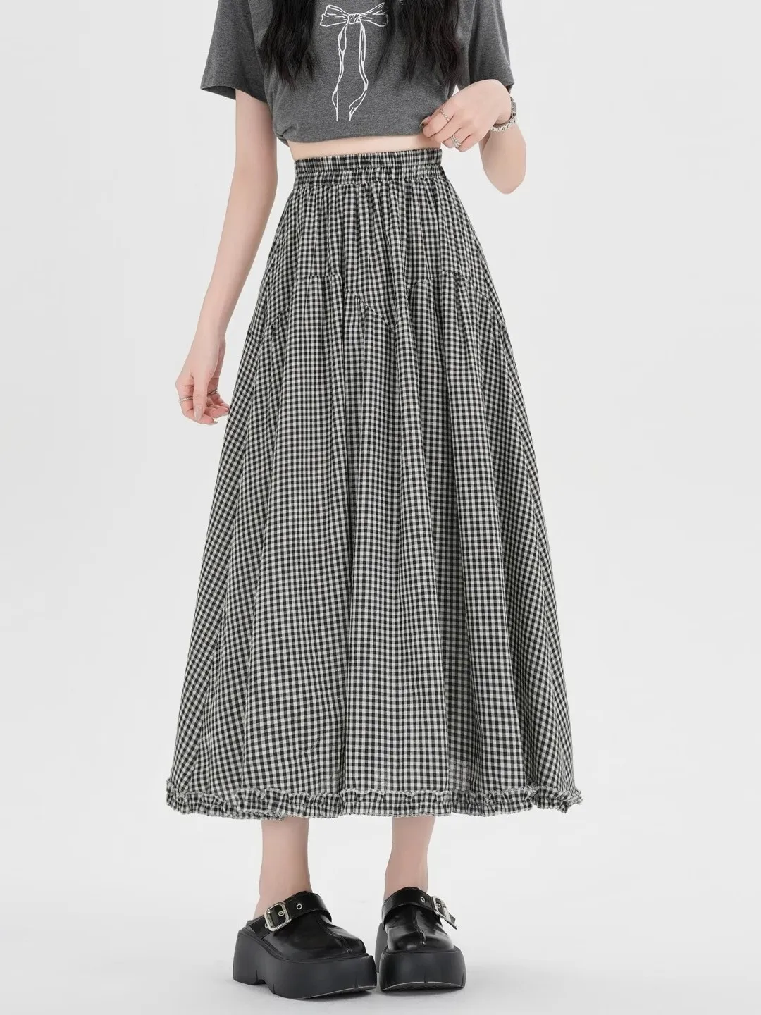 Юбка миди А-силуэта в клетку «гингем» для женщин, весна-лето, новая модель, с эластичной высокой талией, утягивающая, расклешенная, длинная юбка
Юбка миди А-силуэта в клетку «гингем» для женщин, весна-лето, новая модель, с эластичной высокой талией, утягивающая, расклешенная, длинная юбка