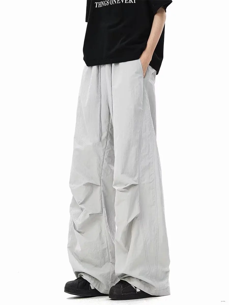 Американские повседневные свободные брюки прямого кроя для мужчин, летние новые модные брендовые быстросохнущие брюки со складками
Американские повседневные свободные брюки прямого кроя для мужчин, летние новые модные брендовые быстросохнущие брюки со складками