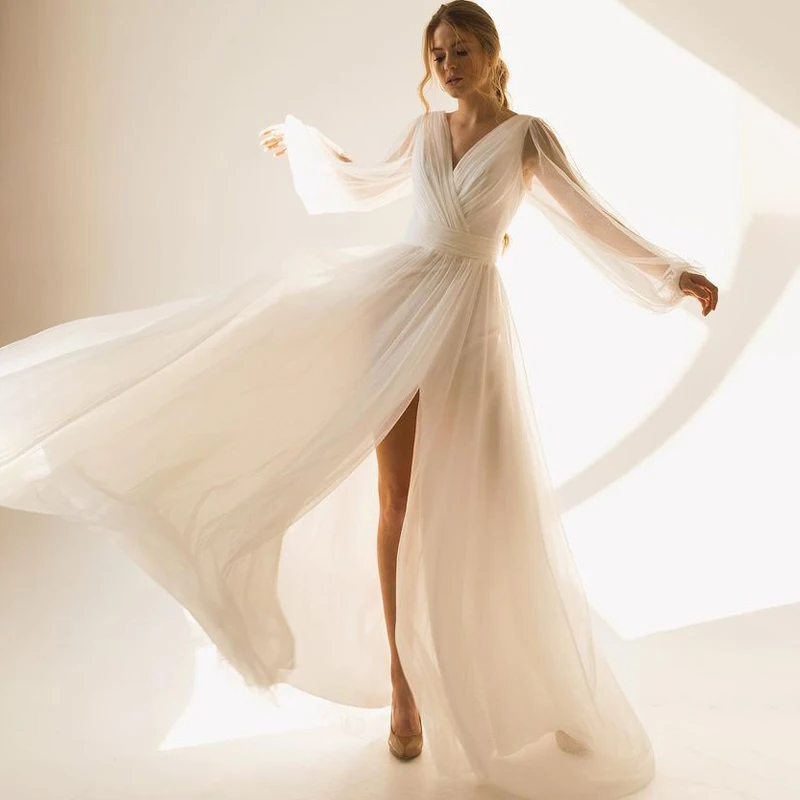 2024 A-Line Glitter Tulle Wedding Dress Sexy V-Neck Long Sleeve Slit Pleats Bridal Gowns Vestidos De Novia
2024 A-Line Glitter Tulle Wedding Dress Sexy V-Neck Long Sleeve Slit Pleats Bridal Gowns Vestidos De Novia