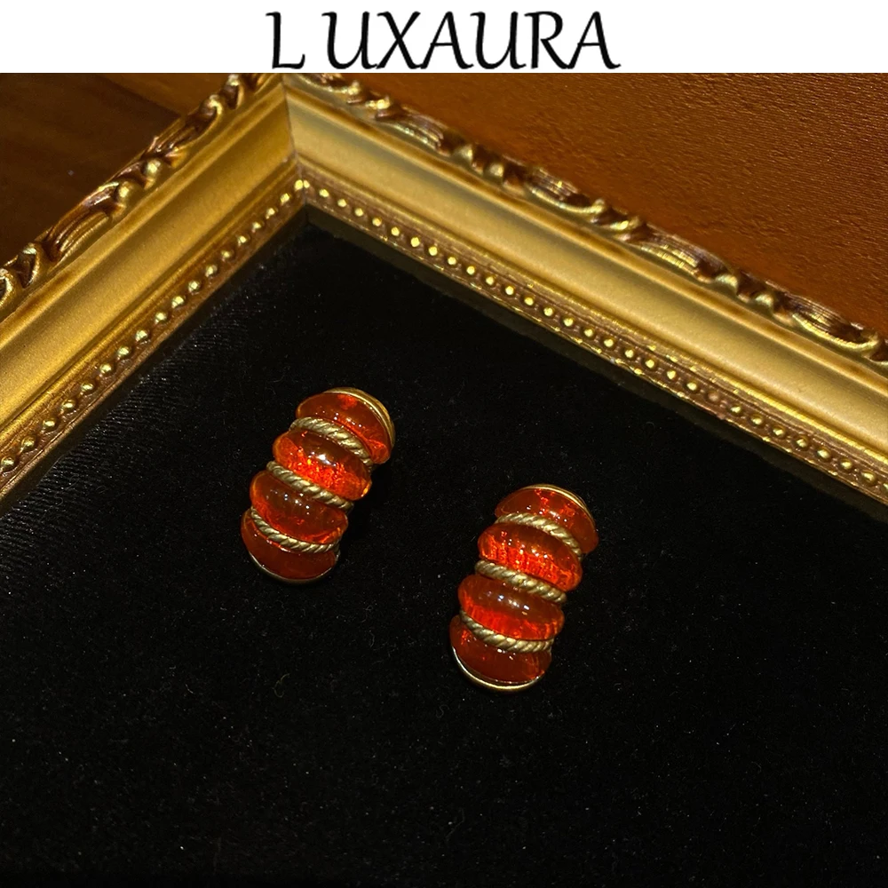 Vintage fashion classic red resin design paired with Bohemian women's Accessory stud earrings
Vintage fashion classic red resin design paired with Bohemian women's Accessory stud earrings