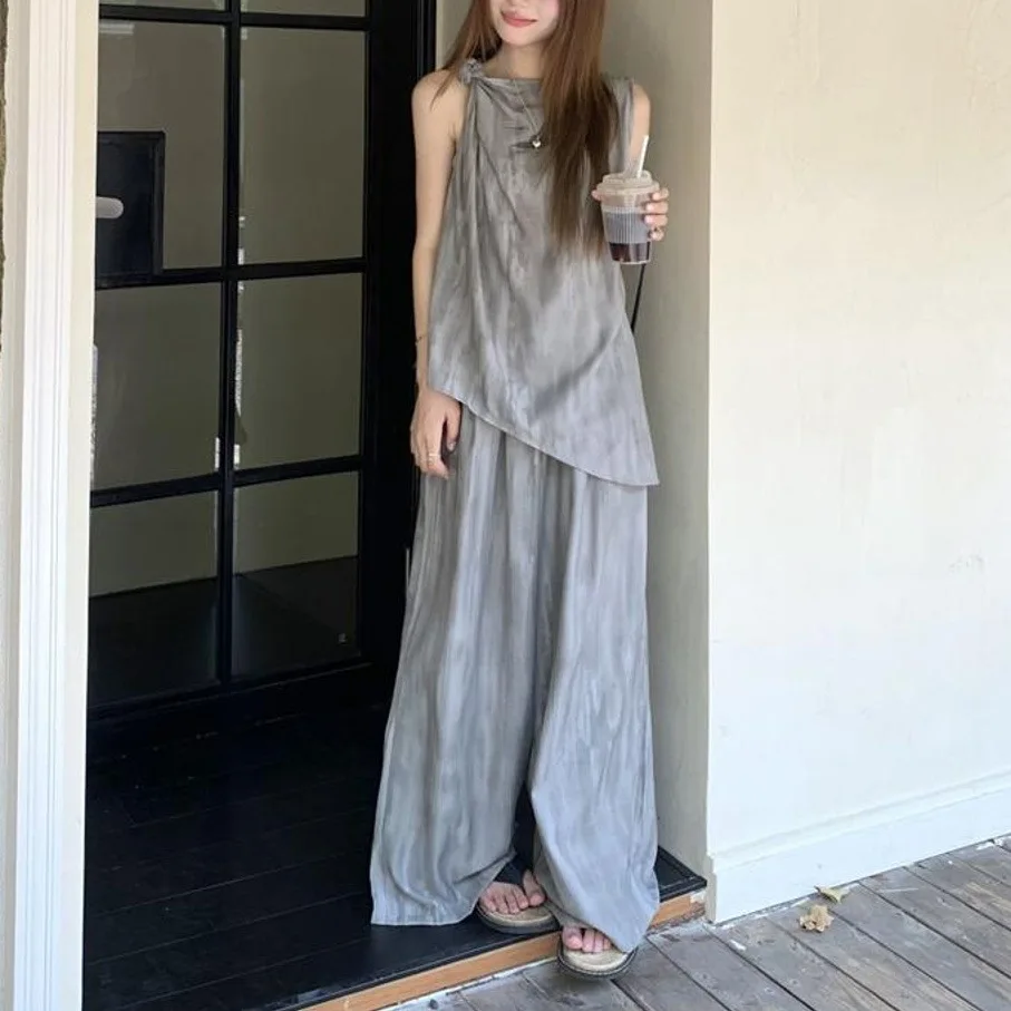 2026 Spring/Summer New Retro Loose Irregular Sleeveless Tank Top Wide Leg Casual Pants Women's Fashion Two Piece Set
2026 Spring/Summer New Retro Loose Irregular Sleeveless Tank Top Wide Leg Casual Pants Women's Fashion Two Piece Set