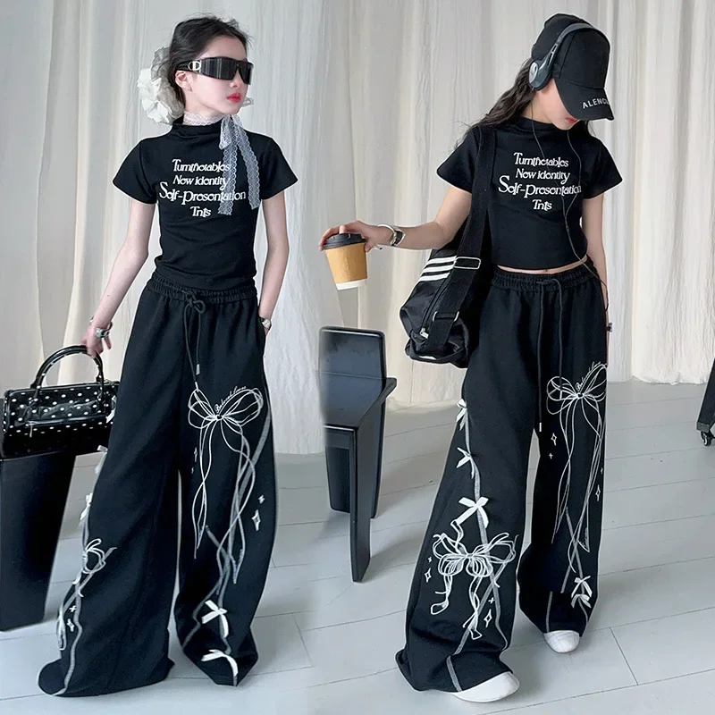 Teen Girls Hip Hop Street Dance Jazz Clothes Set Black Short Top T-shirt+Bow Wide Leg Pants 2pcs Junior Kids Suit Child Outfits
Teen Girls Hip Hop Street Dance Jazz Clothes Set Black Short Top T-shirt+Bow Wide Leg Pants 2pcs Junior Kids Suit Child Outfits