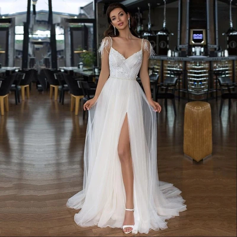 Sexy Slit Wedding Dresses V-Neck Sleeveless Backless Tulle Bridal Gowns Lace Appliques Vestidos De Noiva
Sexy Slit Wedding Dresses V-Neck Sleeveless Backless Tulle Bridal Gowns Lace Appliques Vestidos De Noiva
