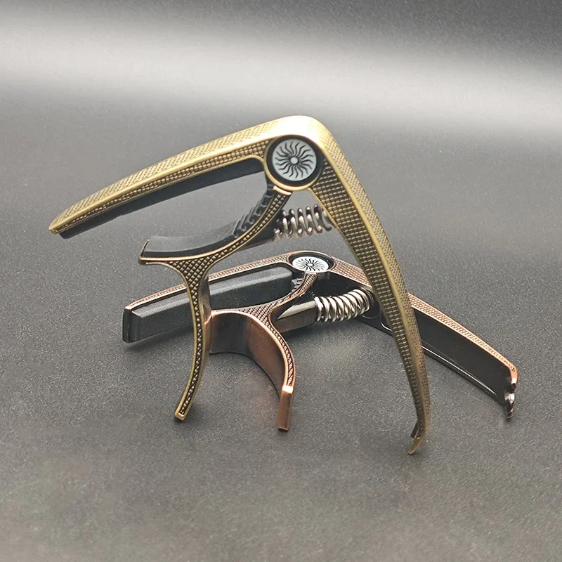 Alligator Pattern Guitar Capo Multi Functional Capo for Acoustic Guitars with Pin Puller Copper/Brozen
Alligator Pattern Guitar Capo Multi Functional Capo for Acoustic Guitars with Pin Puller Copper/Brozen