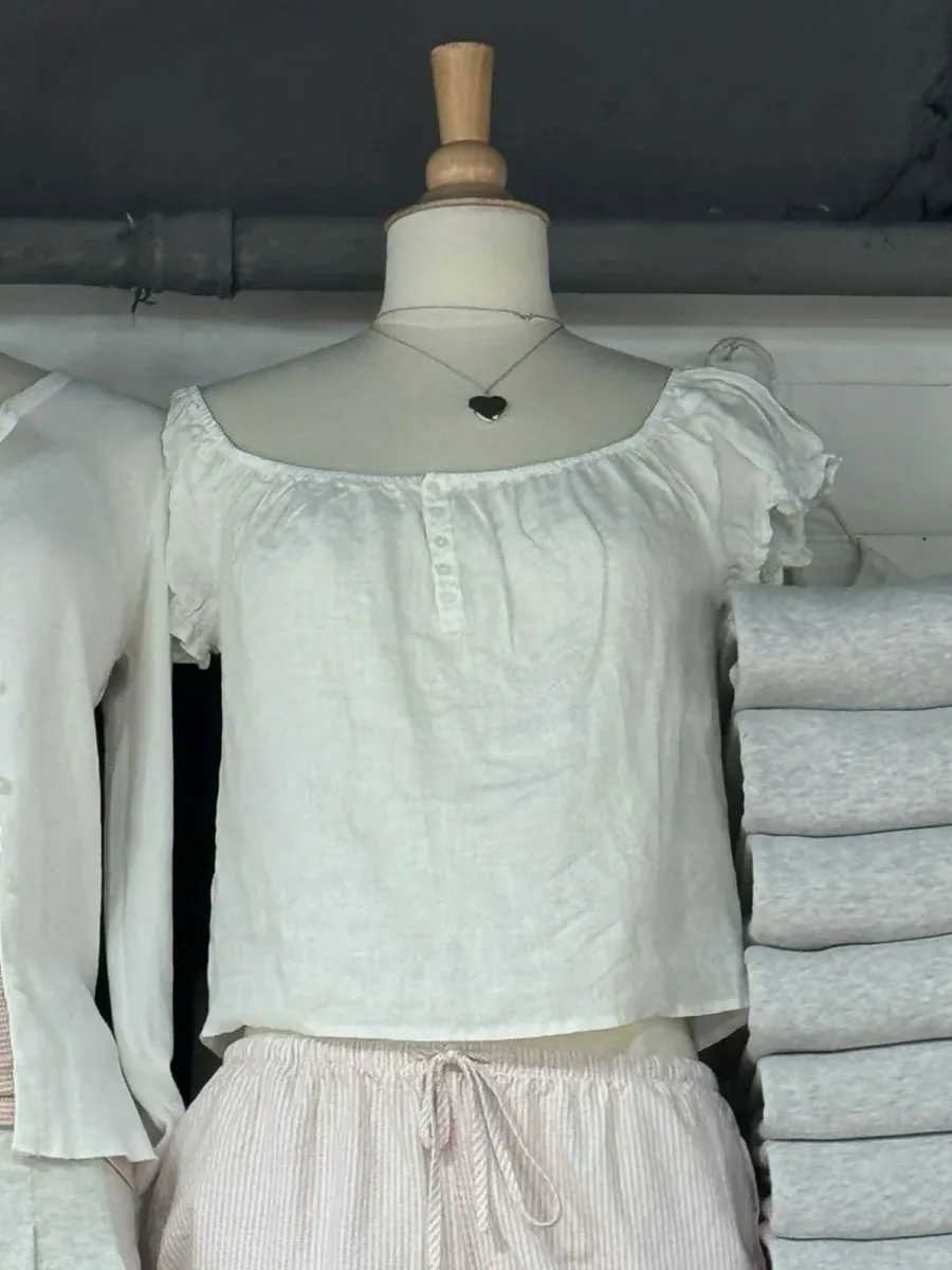 Five Buttons White Thin Blouse T-shirt Women Stretch Scoop Neck Puff Sleeve Tee Shirts Summer Preppy Style Sweet Casual Crop Top
Five Buttons White Thin Blouse T-shirt Women Stretch Scoop Neck Puff Sleeve Tee Shirts Summer Preppy Style Sweet Casual Crop Top