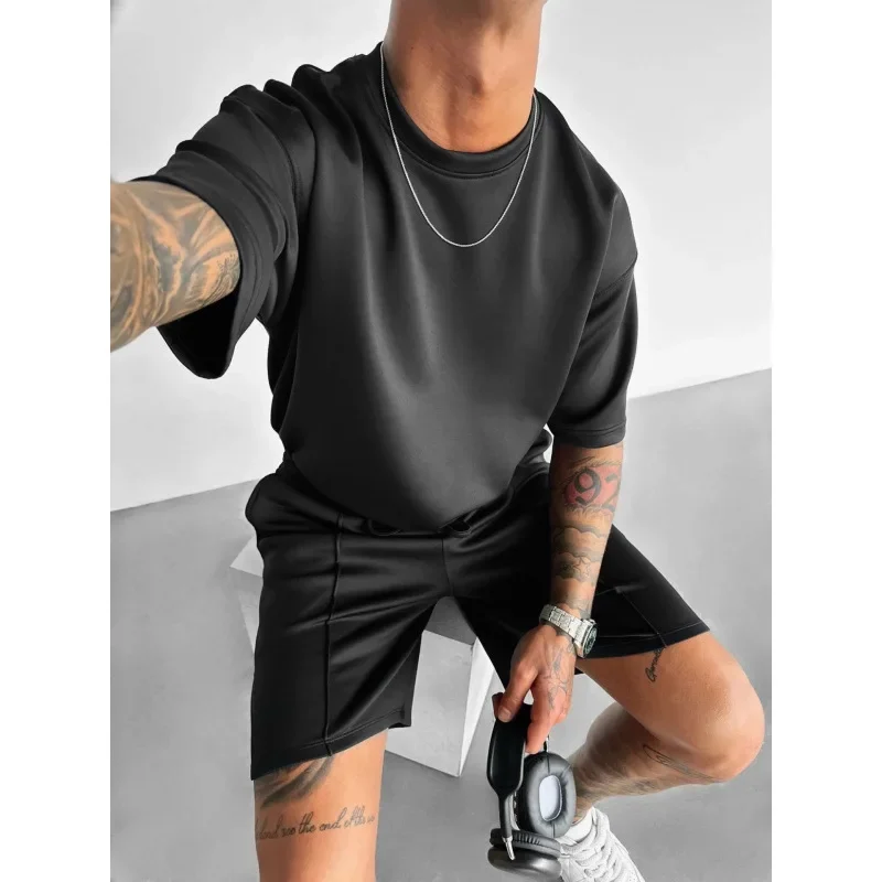 2025 Summer New Fashion Men's Breathable Solid Color 2 Piece Sets Short Sleeve O-neck T-shirts Knee Length Loose Shorts Male
2025 Summer New Fashion Men's Breathable Solid Color 2 Piece Sets Short Sleeve O-neck T-shirts Knee Length Loose Shorts Male