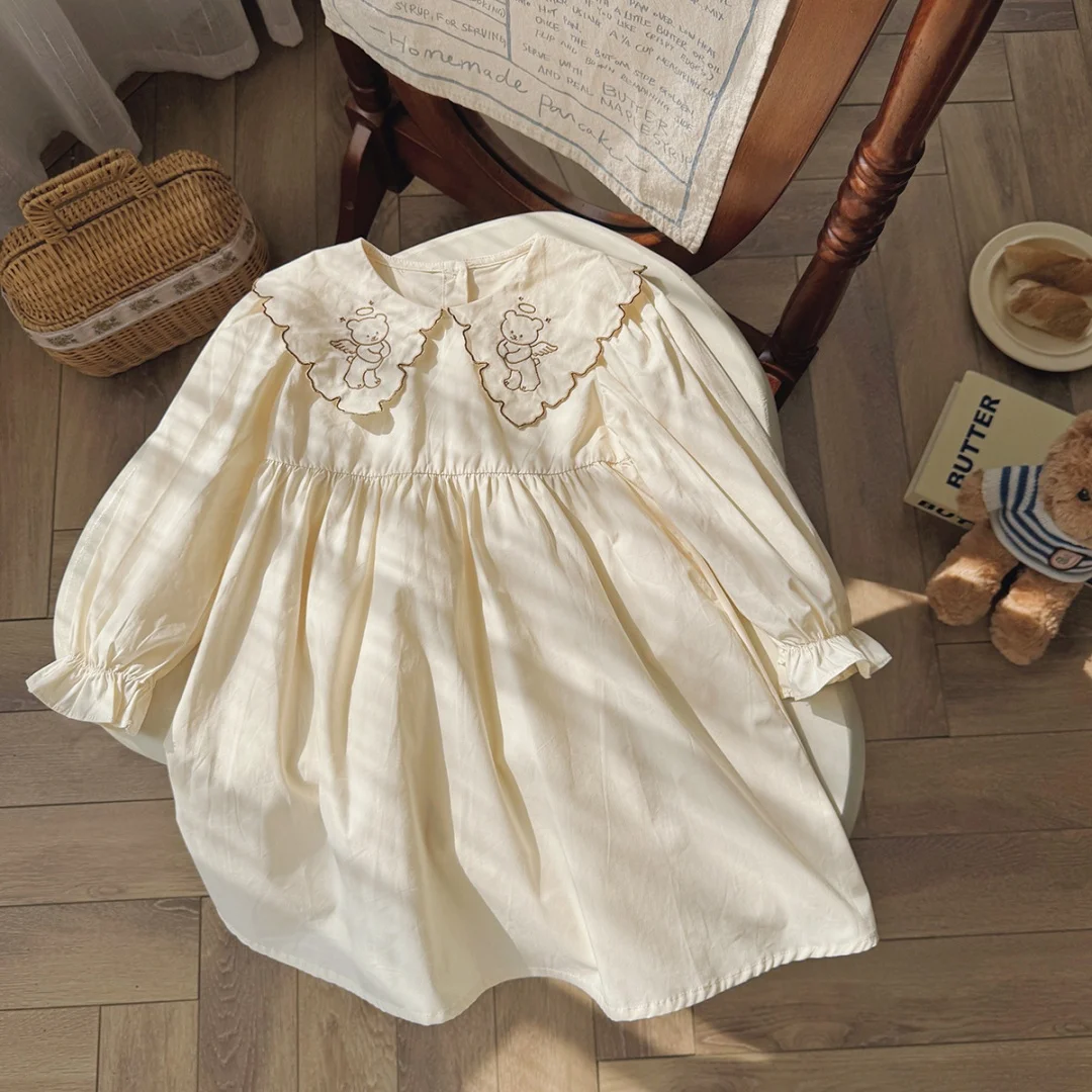 Hot Sale Korean Style Angel Bear Embroidery Girls Dress Spring 2026 Doll Collar Long Sleeve Children's Cotton Skirt
Hot Sale Korean Style Angel Bear Embroidery Girls Dress Spring 2026 Doll Collar Long Sleeve Children's Cotton Skirt