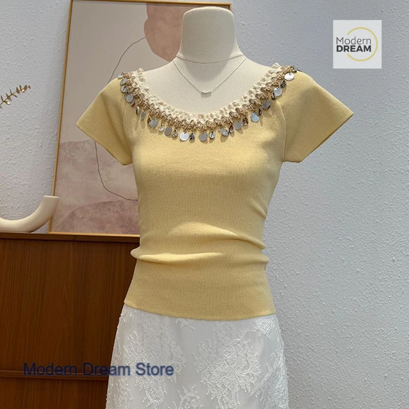 Korean word shoulder heavy industry knitted sequined short-sleeved T-shirt women's summer new beaded tassel beautiful top.
Korean word shoulder heavy industry knitted sequined short-sleeved T-shirt women's summer new beaded tassel beautiful top.