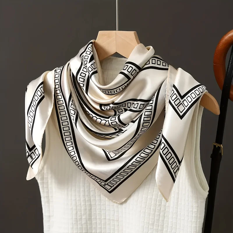 Elegant black and white geometric pattern printed square scarf, a fashionable neck accessory suitable for women to wear
Elegant black and white geometric pattern printed square scarf, a fashionable neck accessory suitable for women to wear