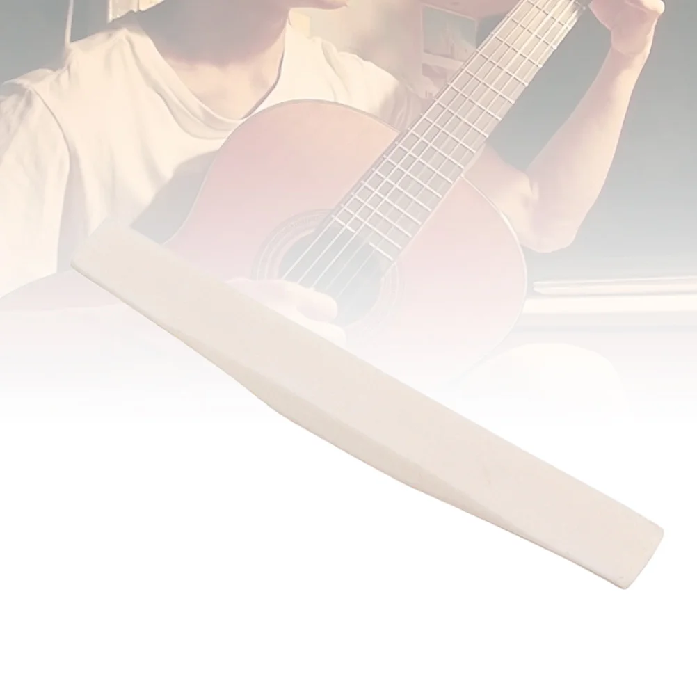 1pc Guitar Bridge Saddle 75Mm Natural Buffalo Bone For Acoustic Guitar Replacement Part Musical Instruments Accessory 
1pc Guitar Bridge Saddle 75Mm Natural Buffalo Bone For Acoustic Guitar Replacement Part Musical Instruments Accessory