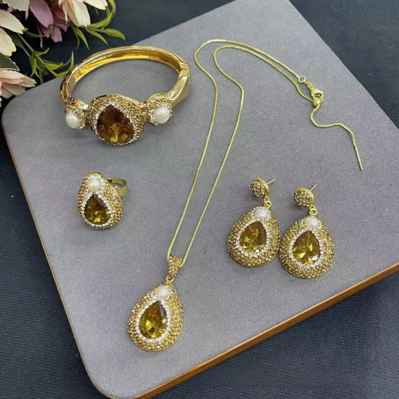 European And American Popular Sudan Stone Color Changing Stone Necklace Earrings Rings Women Handmade Rhinestone Jewelry Set
European And American Popular Sudan Stone Color Changing Stone Necklace Earrings Rings Women Handmade Rhinestone Jewelry Set