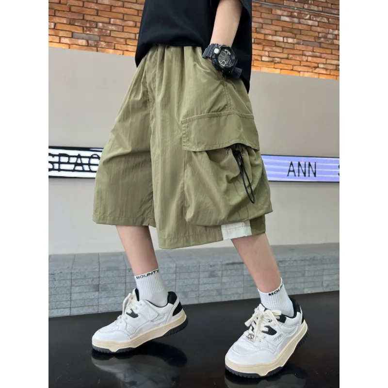 Summer New Teenage Children's Casual Shorts Children's Children's Large Pockets in Five-minute Trousers Thin Versatile
Summer New Teenage Children's Casual Shorts Children's Children's Large Pockets in Five-minute Trousers Thin Versatile