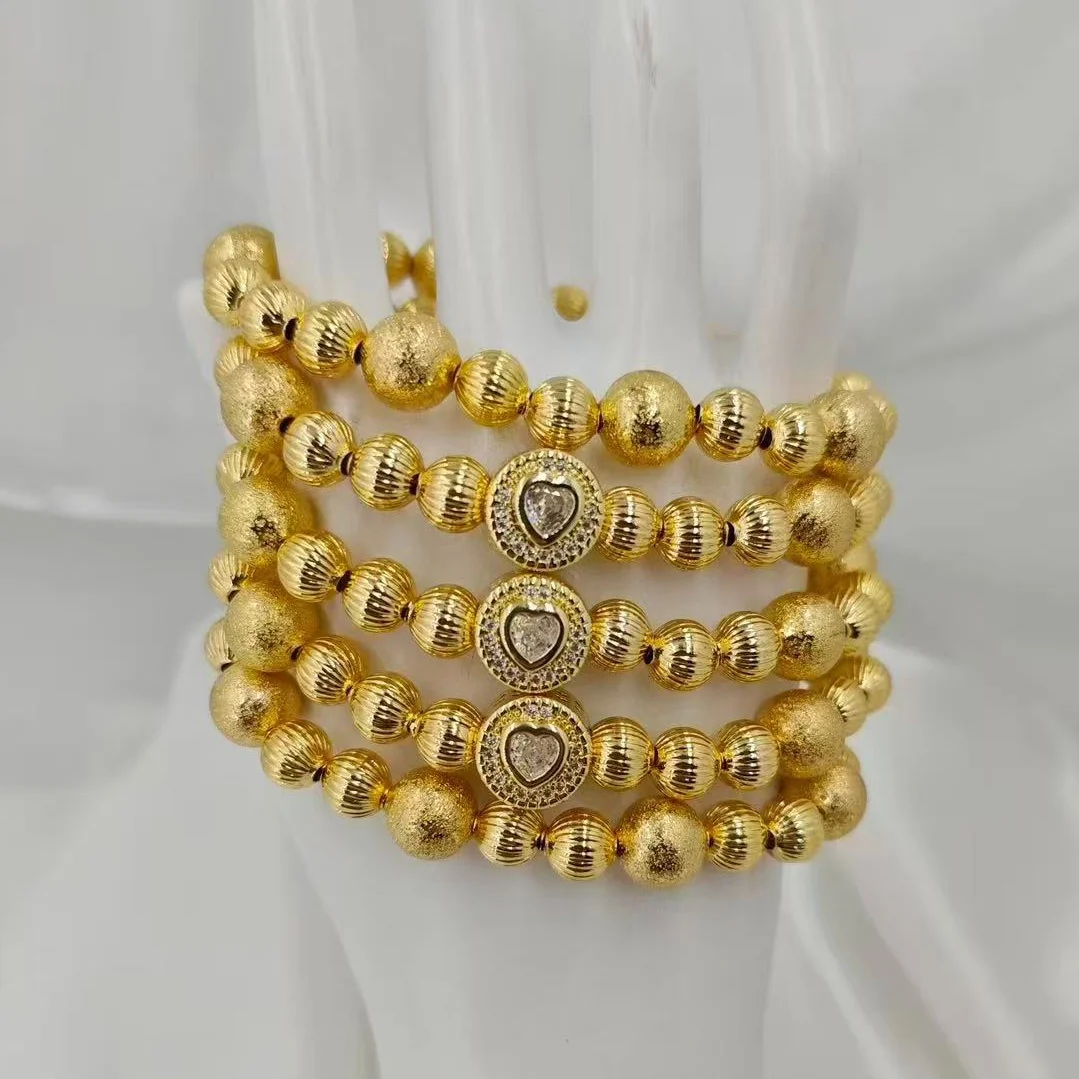 New Eye-Catching Multi-Layer Stretch Bracelet with Mixed Gold Beads & Heart Rhinestones - Chic Women's Party & Daily Accessory
New Eye-Catching Multi-Layer Stretch Bracelet with Mixed Gold Beads & Heart Rhinestones - Chic Women's Party & Daily Accessory