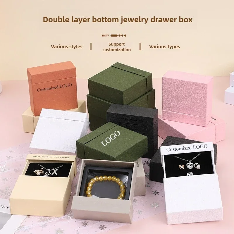 Fashion Suspended Double Layer Bottom Drawer High End Jewelry Gift Box Customized Logo
Fashion Suspended Double Layer Bottom Drawer High End Jewelry Gift Box Customized Logo