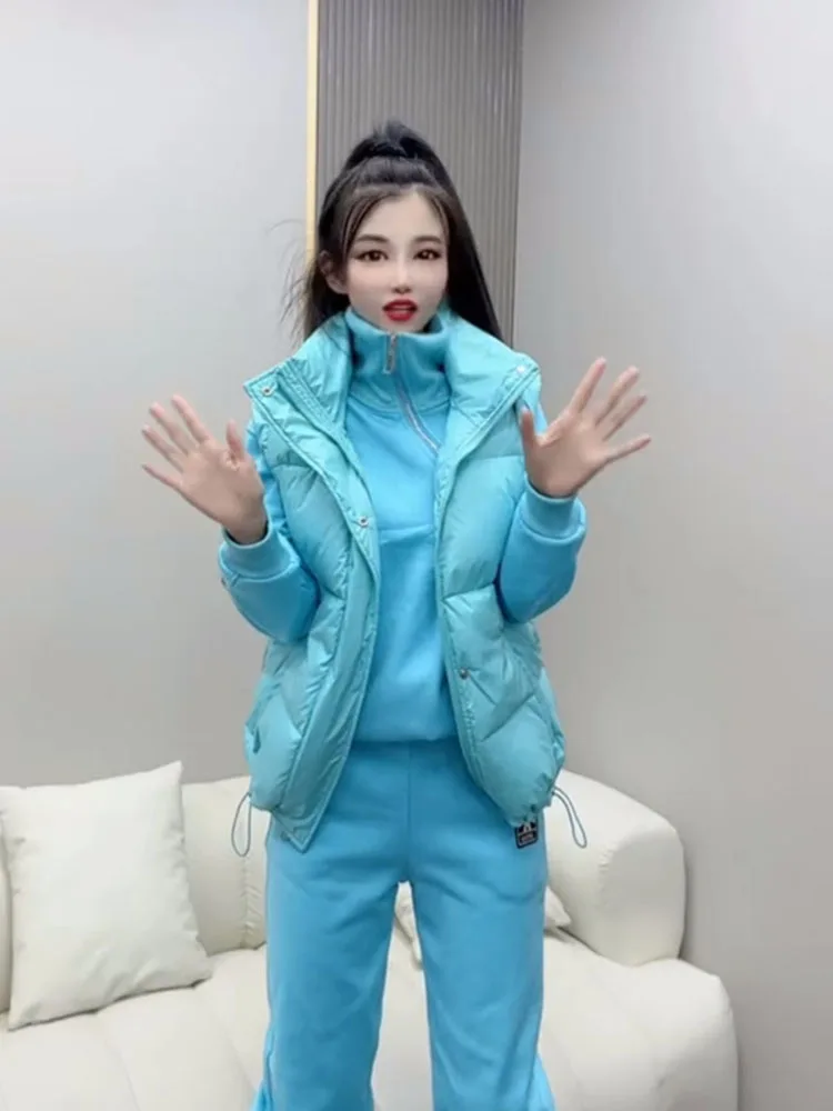 Fashion suit women's 2025 winter new Korean version solid color zipper cotton vest with Pants plush thickened three piece set
Fashion suit women's 2025 winter new Korean version solid color zipper cotton vest with Pants plush thickened three piece set