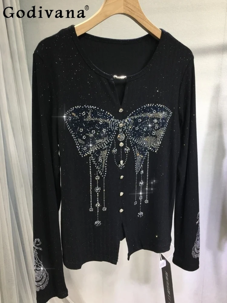 Large size European bow heavy industry hot diamond women's bottoming shirt autumn winter black V-neck long sleeve leisure top
Large size European bow heavy industry hot diamond women's bottoming shirt autumn winter black V-neck long sleeve leisure top