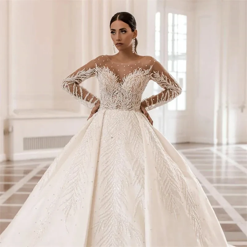 Exquisite Ball Gown Wedding Dresses O-Neck Appliques Lace Pearl Bridal Gown Long Sleeve Backless Vestido De Noiva Customized
Exquisite Ball Gown Wedding Dresses O-Neck Appliques Lace Pearl Bridal Gown Long Sleeve Backless Vestido De Noiva Customized