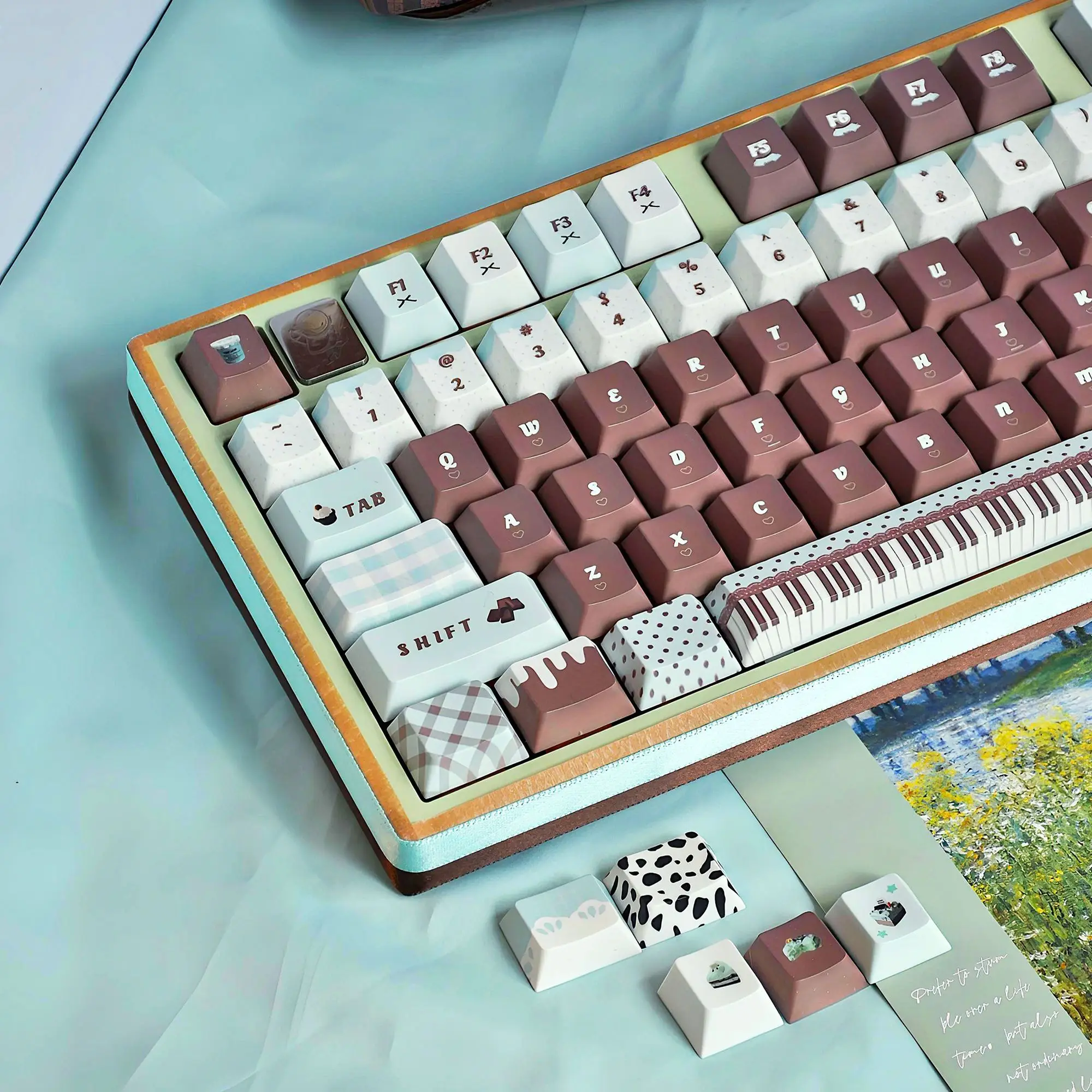 Thin and clever dessert keycaps Original cute brown PBT MOA original front side transparent keyboard keycaps
Thin and clever dessert keycaps Original cute brown PBT MOA original front side transparent keyboard keycaps