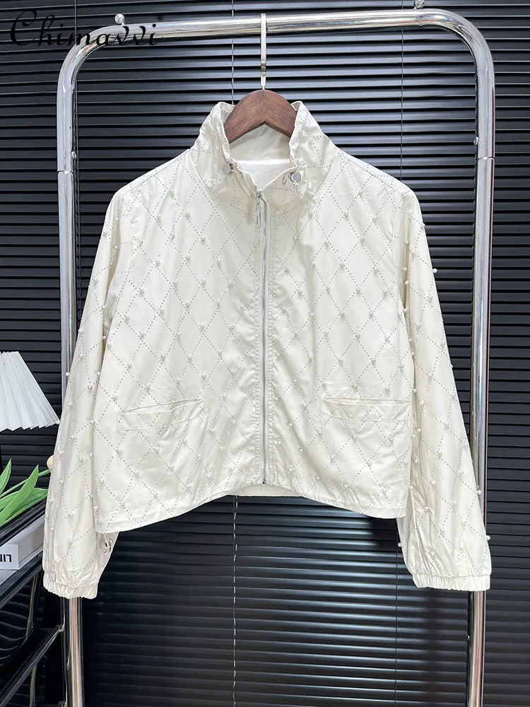 European Heavy Beaded Hot Diamond Stand-up Collar Zipper Jacket Women's Spring New Fashion Loose Casual Long-sleeved Coat Tops
European Heavy Beaded Hot Diamond Stand-up Collar Zipper Jacket Women's Spring New Fashion Loose Casual Long-sleeved Coat Tops