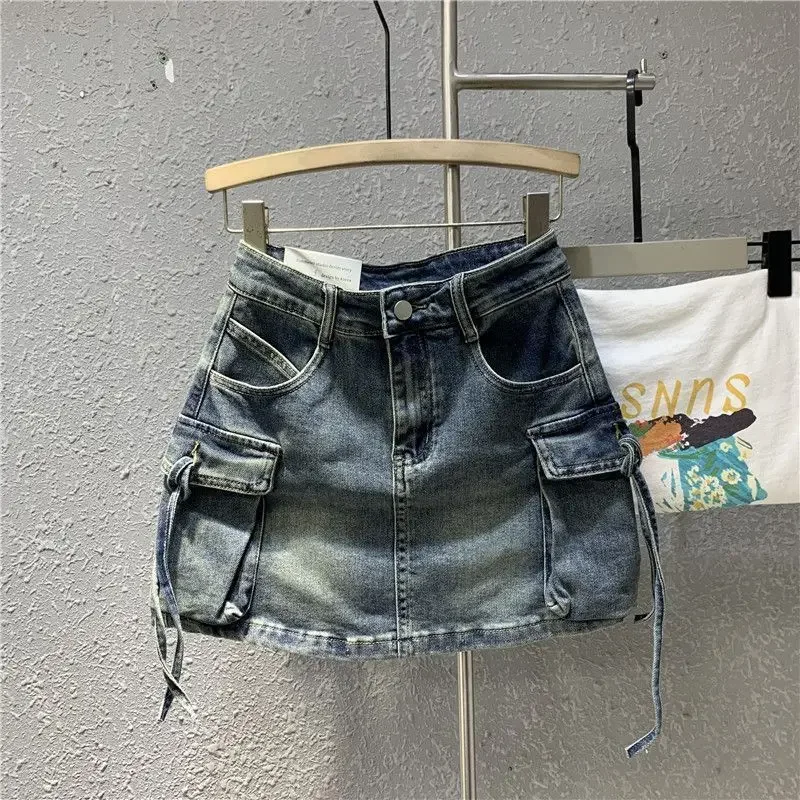 Women Denim Skirt Summer Pocket Slim Fit Mini Jean Skirt Hot Girl Solid Color Casual Cargo Skirt Female
Women Denim Skirt Summer Pocket Slim Fit Mini Jean Skirt Hot Girl Solid Color Casual Cargo Skirt Female