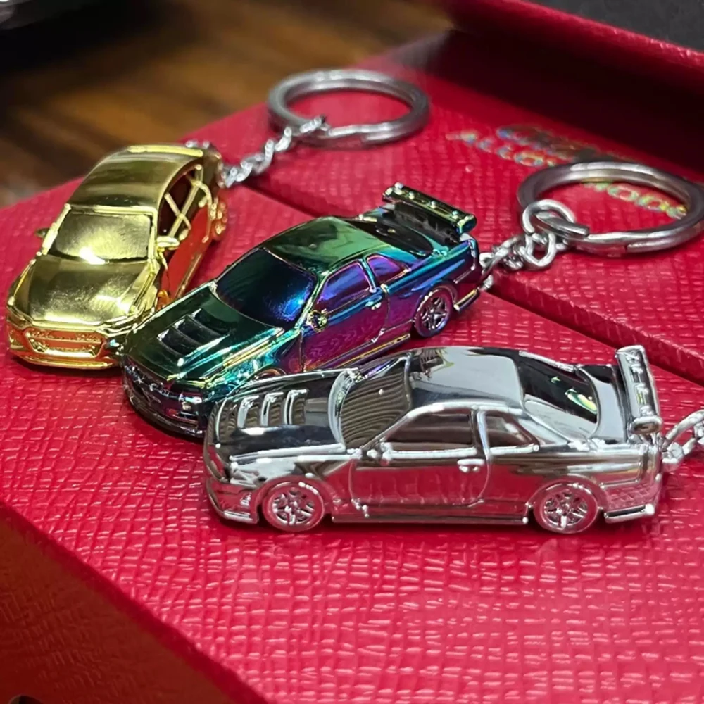 1:64 GTR R34 RS7 гальванический сплав модель автомобиля игрушечный брелок для рюкзака аксессуары металлический маленький кулон автомобильный брелок для ключей подарок для взрослых и детей
1:64 GTR R34 RS7 гальванический сплав модель автомобиля игрушечный брелок для рюкзака аксессуары металлический маленький кулон автомобильный брелок для ключей подарок для взрослых и детей