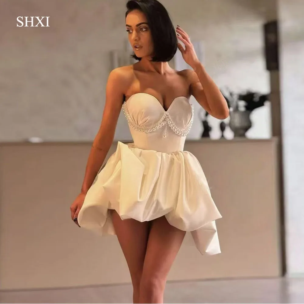 SHXI Romantic Sweetheart Short Wedding Party Dress Puffy A Line Satin Ball Gown Elegant Evening Gown High End Customized Unique
SHXI Romantic Sweetheart Short Wedding Party Dress Puffy A Line Satin Ball Gown Elegant Evening Gown High End Customized Unique